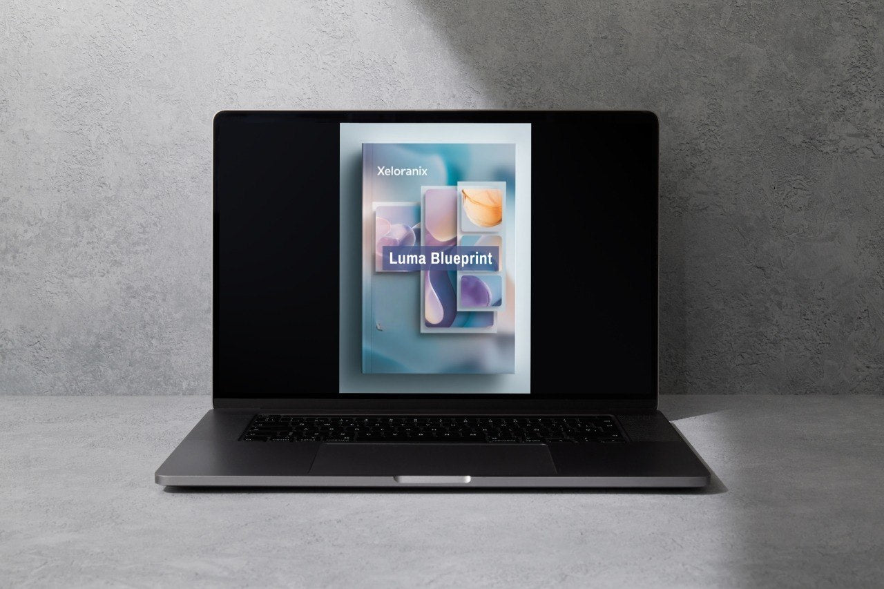 Laptop displaying a cloud framework software on a gray background